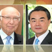 Sartaj Aziz and Wang Xi