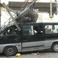 Passenger Vans Electric Pole Hit