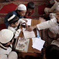 Children Reading Quran