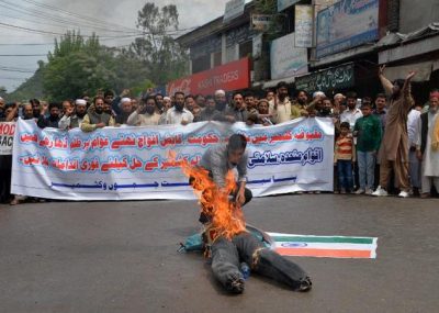 Protesters burn Modi