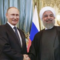 Vladimir Putin and Hassan Rouhani